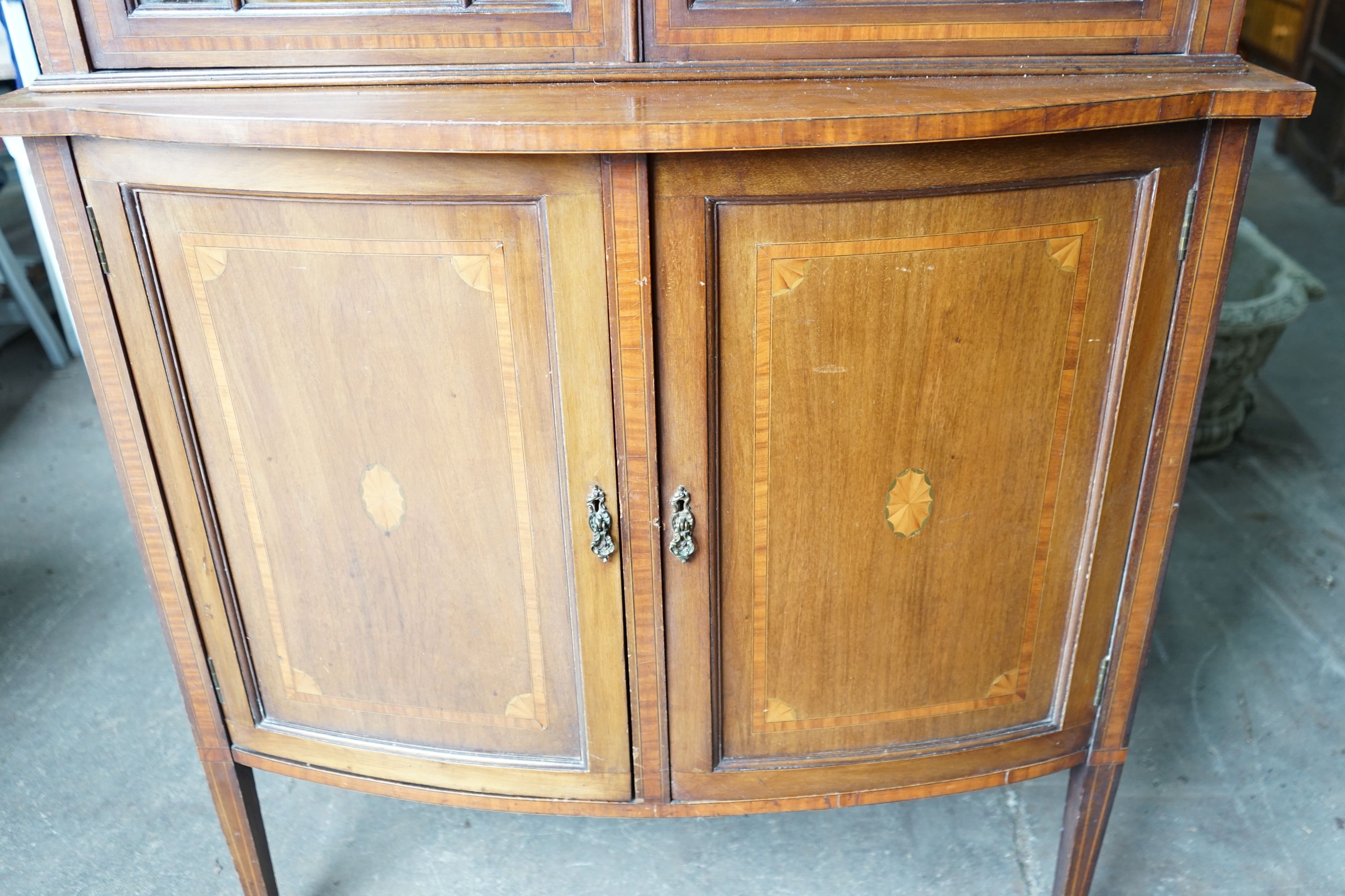 An Edwardian inlaid and satinwood banded mahogany bowfront display cabinet, width 92cm, depth 42cm, height 191cm